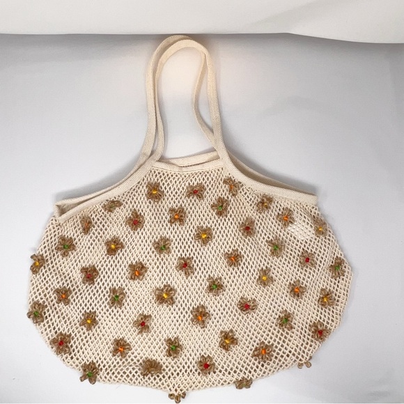 Urban outfitters- Knit bag with flowers never used - Picture 4 of 10